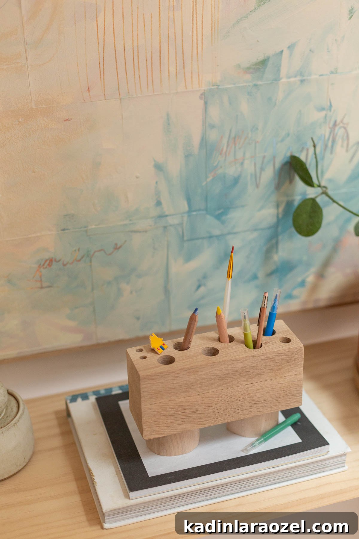 DIY Pencil Holder Makeover: Stylish Steps to Upcycle a Holder 9 wood desk with wooden office organizer and abstract art
