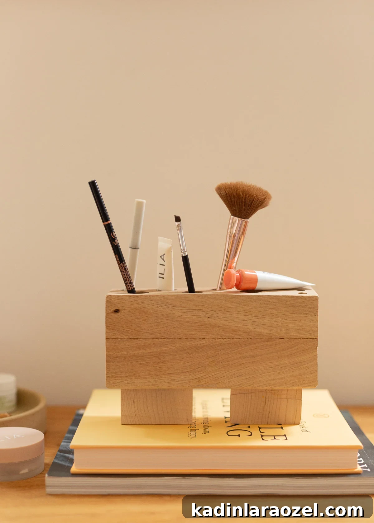 DIY Pencil Holder Makeover: Stylish Steps to Upcycle a Holder 10 Minimal wood makeup organizer on wood counter with makeup surrounding it