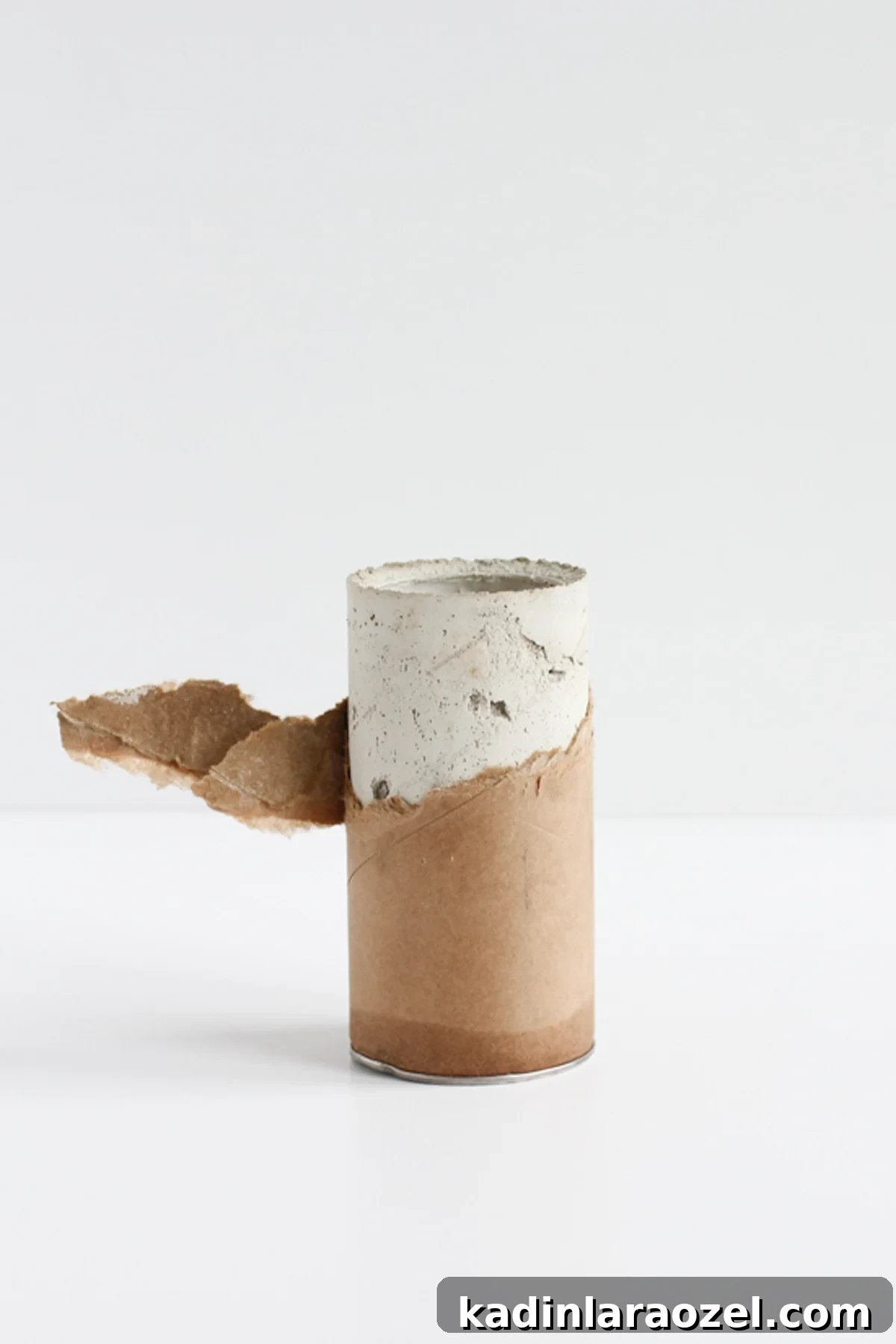 Coloring Concrete: Step-by-Step Guide to Make a Stylish Concrete Vase 6 Removing cardboard tube from concrete vase mold