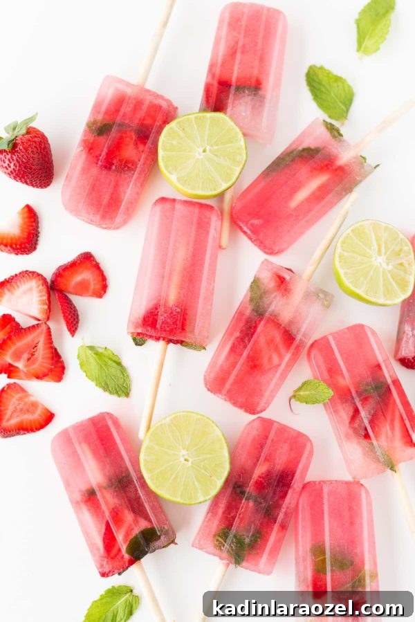 Oh, Mo You Didn’t: Strawberry Mojito Popsicle Recipe 3 Boozy Strawberry Mojito Popsicles