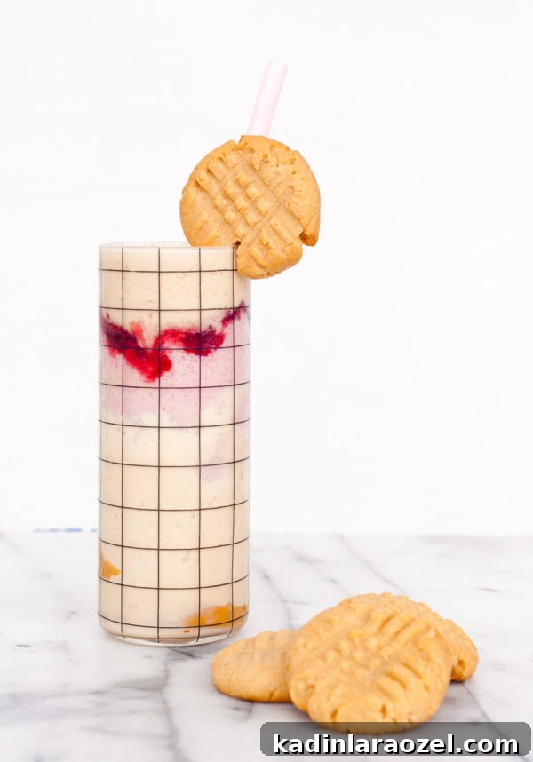 Color-Blocked Peanut Butter & Jelly Milkshakes for Milkshake Monday 2 Color Blocked Peanut Butter and Jelly Milkshakes