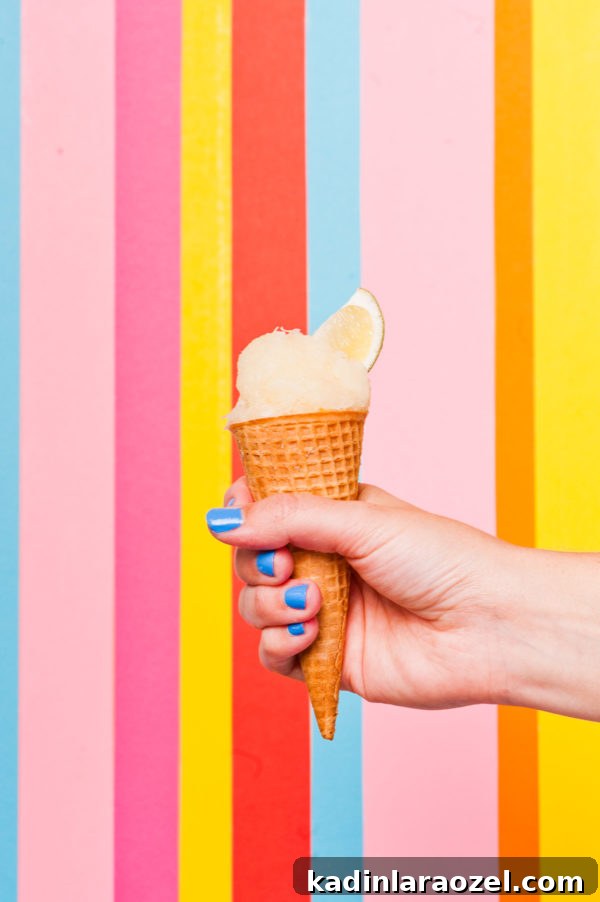 3 Refreshing Vegan Sorbet Recipes + DIY Colorful Sorbet Bar Guide 7 Lemon lime sorbet in a cone
