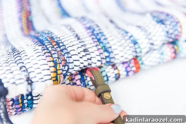 DIY Crossbody Bag for Under $10: Step-by-Step Guide 11 Closeup image of making a woven colorful crossbody bag.