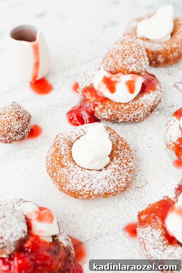Mascarpone French Toast Donuts with Fresh Strawberry Drizzle 2 French Toast Donuts with Mascarpone Cheese and Fresh Strawberry Drizzle