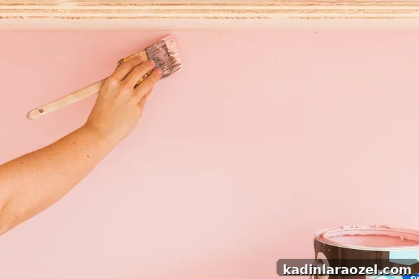 Modern Studio Makeover: DIY Seating and Storage Before & After 12 Painted built-in by Sherwin-Williams