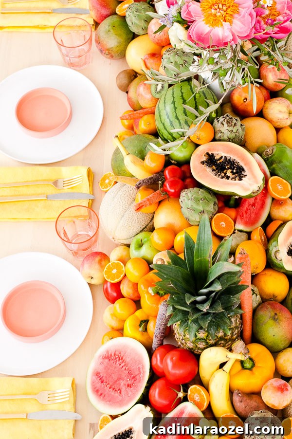 Fresh Summer Party Ideas // DIY floral centerpiece + edible fruit and veggie table runner