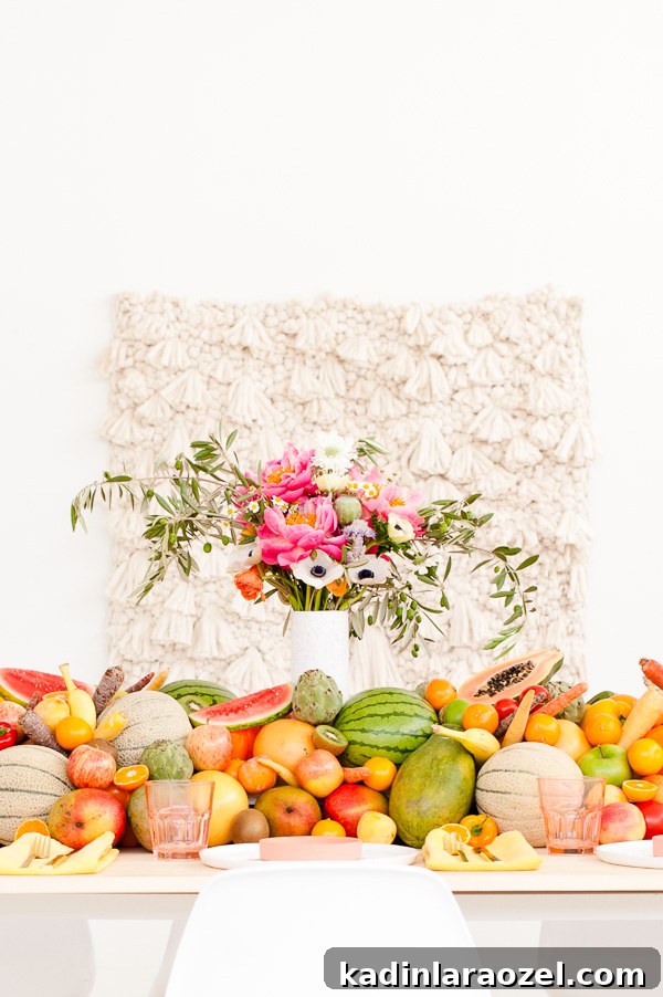 Fresh Summer Party Ideas // DIY floral centerpiece + edible fruit and veggie table runner