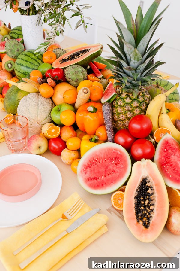 An edible table runner, filled with fresh fruits and veggies.