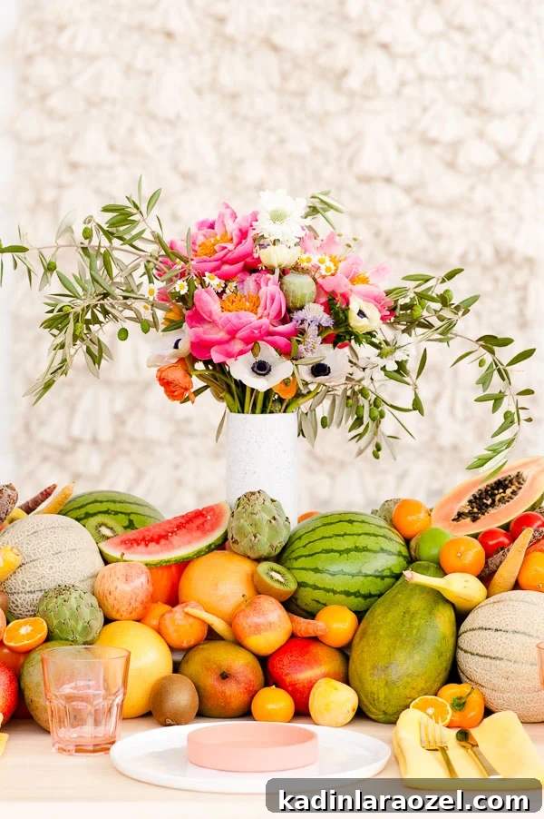 Fresh Summer Party Ideas // DIY floral centerpiece + edible fruit and veggie table runner