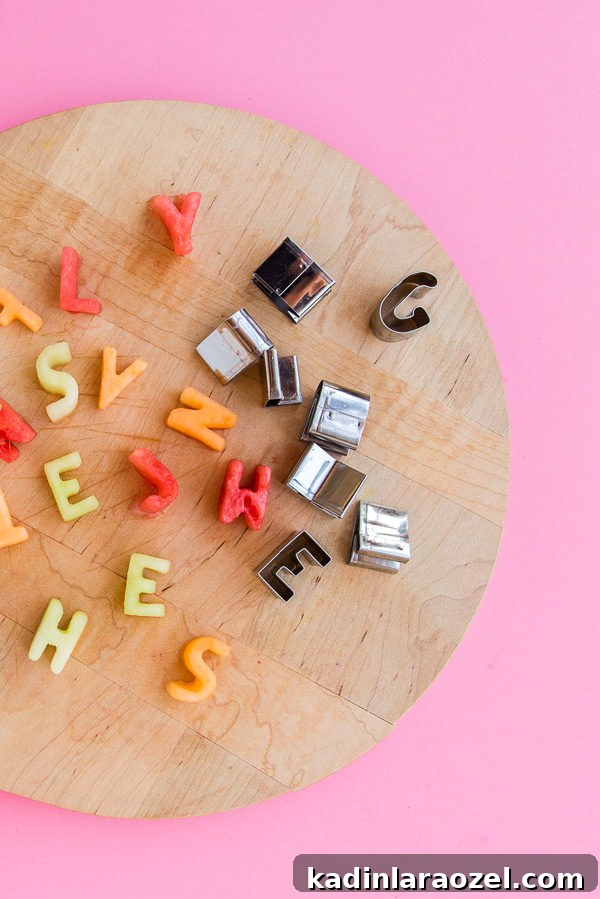 Behind the Scenes: Fruit Stacks, Dirt Spills, Breakfast Tacos & Hopper the Cat 2 Alphabet fruit