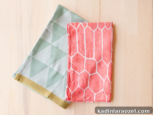 Two tea towels, which are supplies for a DIY pencil organizer