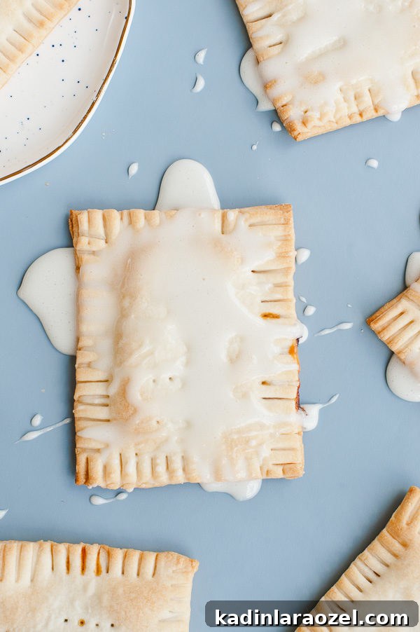 Try this drunken s'more pop tart recipe with chocolate + caramel bourbon filling and a marshmallow glaze.