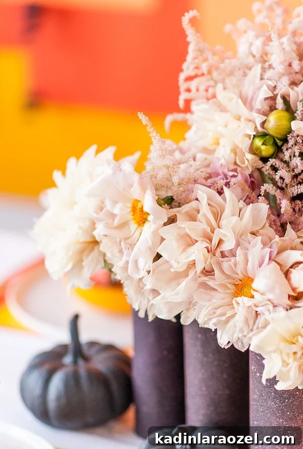 Spooky Surprise: 5 Creative Halloween Party Ideas 6 Dahlias with black vases and pumpkins