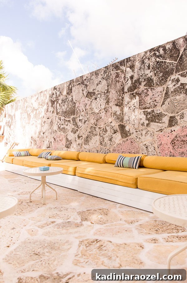 72 Hours in Miami: A 3-Day Itinerary for Food, Beaches & Nightlife 2 Large pieces of stone make a statement in this outdoor patio space in Miami, right next to a pool