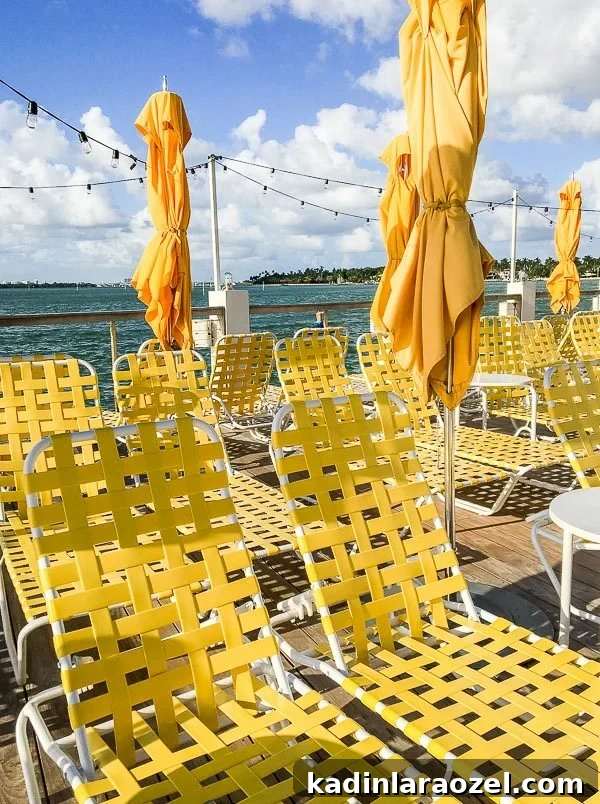 72 Hours in Miami: A 3-Day Itinerary for Food, Beaches & Nightlife 6 Vintage yellow pool chairs in Miami at a beach hotel