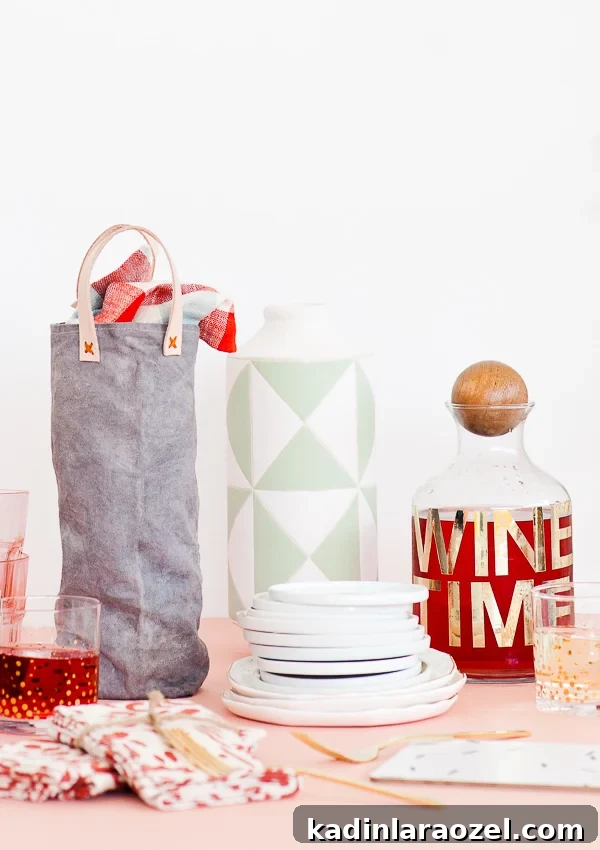 Festive DIY Canvas Wine Bags for Holiday Hostess Gifts 2 Canvas wine bag with leather straps, resting on a bar cart with likeminded items