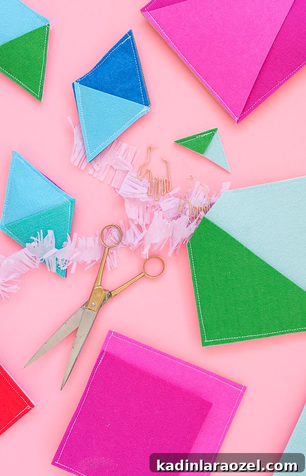 Color-Blocked Felt Gift Pouches: Sewn DIY Wrapping Ideas 2 Unique DIY gift wrap idea. #diy #tutorial #holiday #christmas #christmaspresents #wrapping #felt #giftwrap #colorblocked #pink #geometric