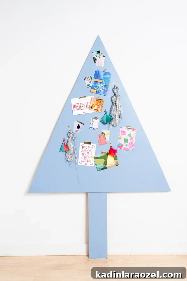 Convertible Space-Saving Christmas Tree That Transforms for Year-Round Decor 5 How to make a space-saving Christmas tree that converts for year round use