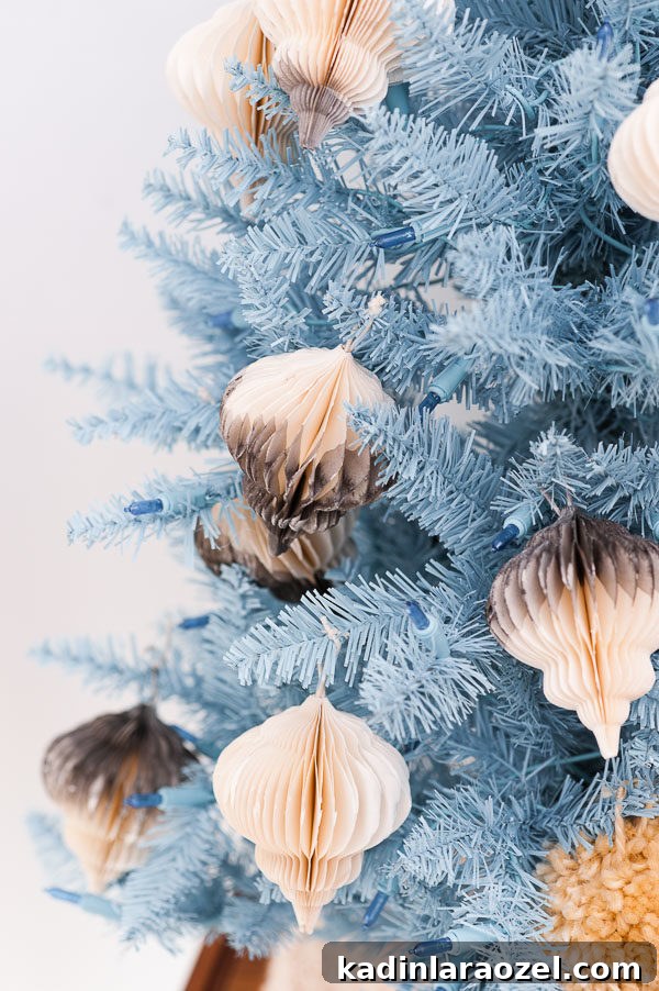 Pastel blue Christmas tree and dip dyed DIY ornaments