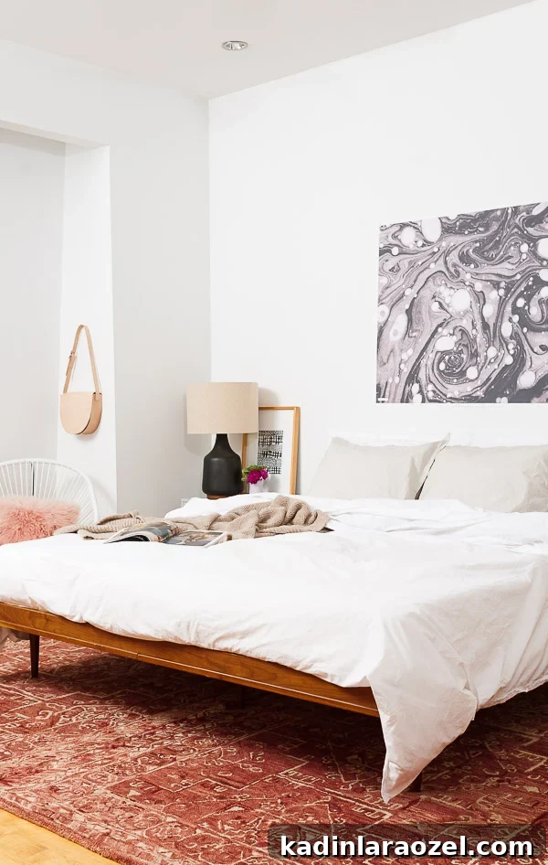 Mid-Century Master Bedroom Makeover: Simple Timeless Design Ideas 2 A minimal mid-century master bedroom makeover from Paper & Stitch