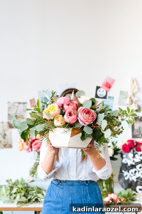 Holiday Flower Power: Winter Style Guide and Atlanta Wreath Workshop 15 Floral centerpiece inspiration with garden roses and eucalyptus