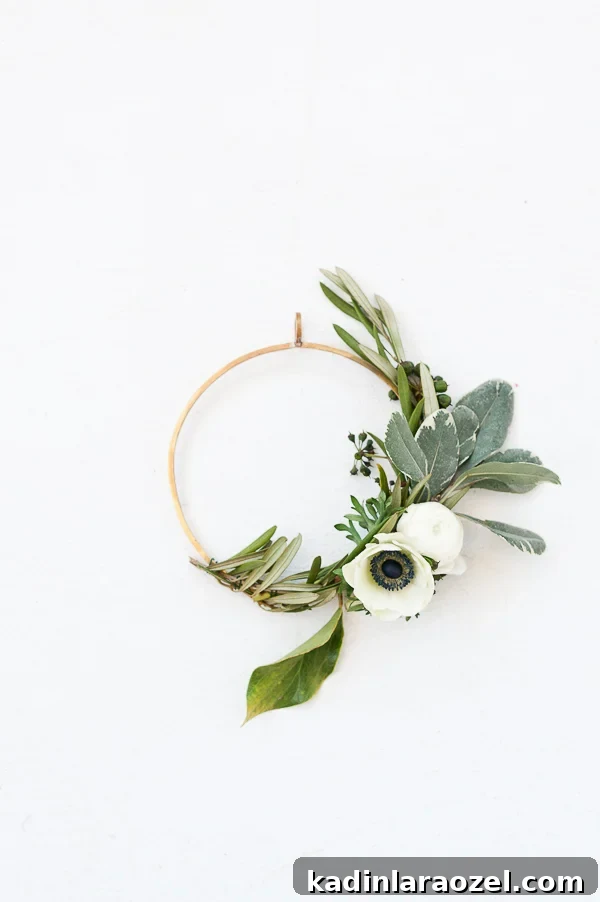 Create an Asymmetrical Wreath: Step-by-Step Design Guide 4 White and green floral asymmetrical wreath - white anemones and ranunculus.