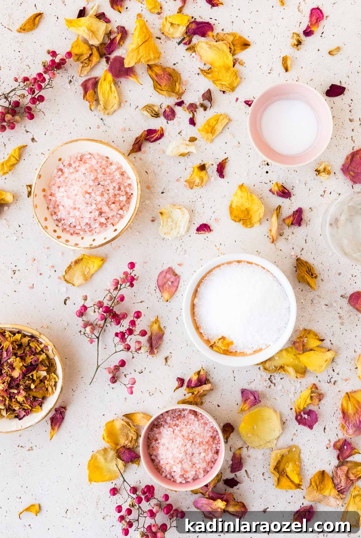 How to Dry Rose Petals and Make Rose Petal Bath Salts 3 different kinds of salt in small bowls with dried flower petals