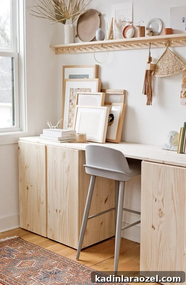 49 Clever DIY Home Organization Ideas to Maximize Space 11 A wood desk with storage cabinets underneath with grey stool underneath.