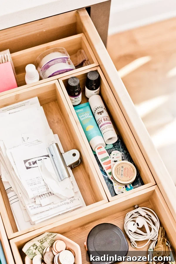 49 Clever DIY Home Organization Ideas to Maximize Space 17 Organizing a junk drawer with drawer organizers to keep receipts and other items clutter-free