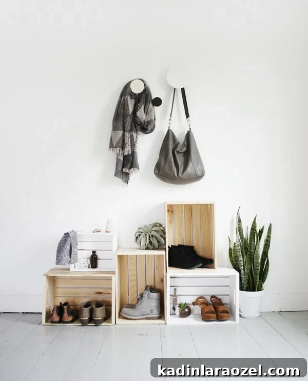 49 Clever DIY Home Organization Ideas to Maximize Space 24 Wood crates stacked on top of one another to create a simple, minimal entryway spot for shoes, bags, etc.