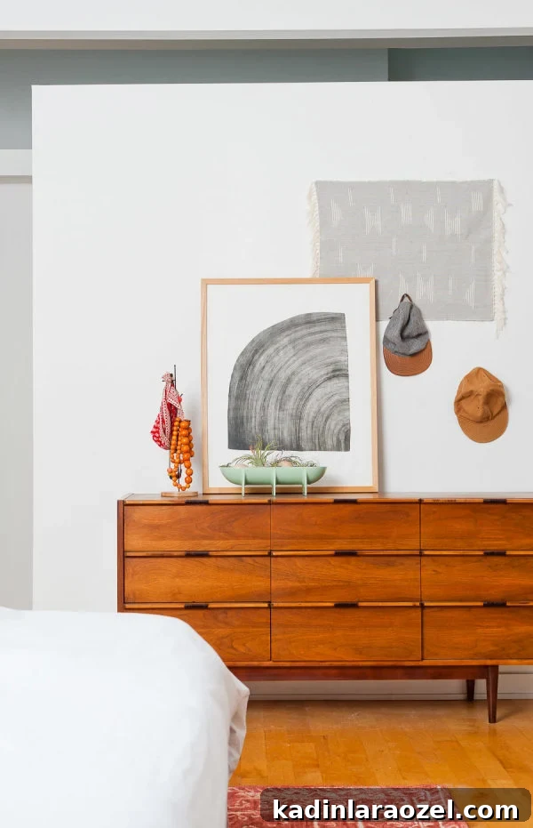 Vintage dresser in mid-century meets minimal master bedroom