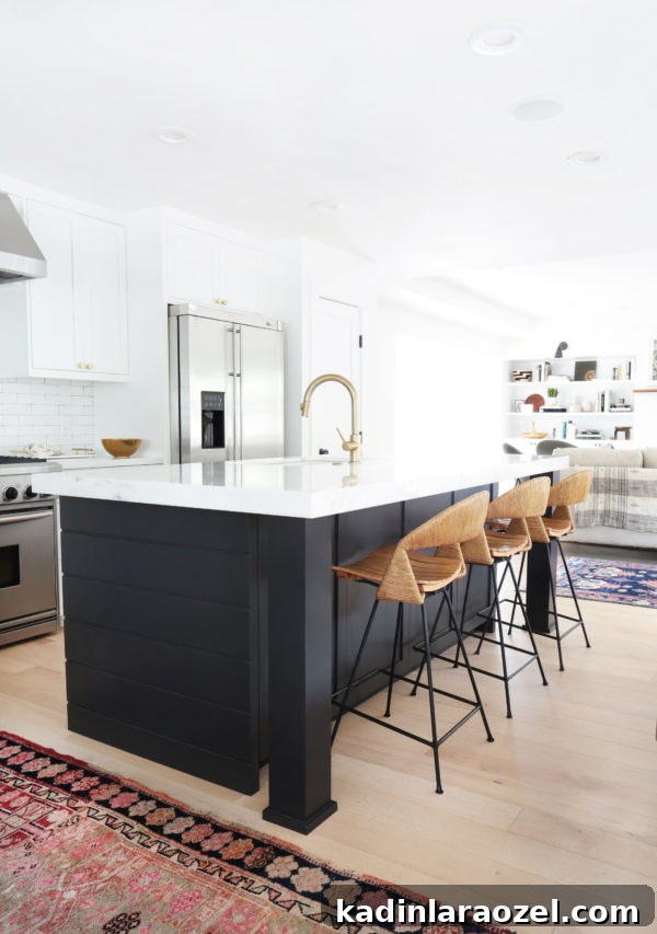 Contrasting island and natural bar stool vibes