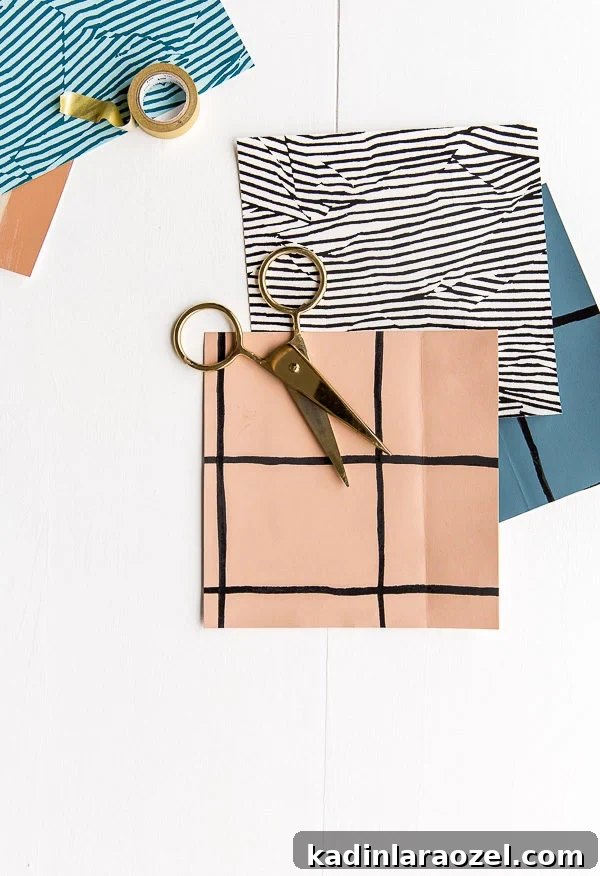 DIY Notebooks in 5 Minutes: Two Simple Paper-Binding Methods 3 Neutral patterned wallpaper and scissors on a white table.