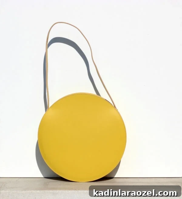 Love this yellow leather circle from BogaBag on Etsy.