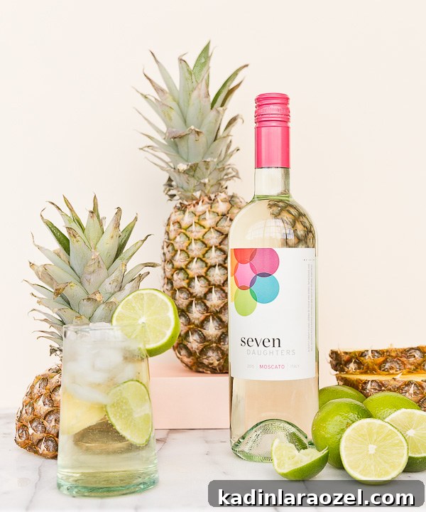Pineapple Lime Sangria Spritzers for Spring Refreshment 7 A tropical cocktail recipe for pineapple lime sangria spritzers.