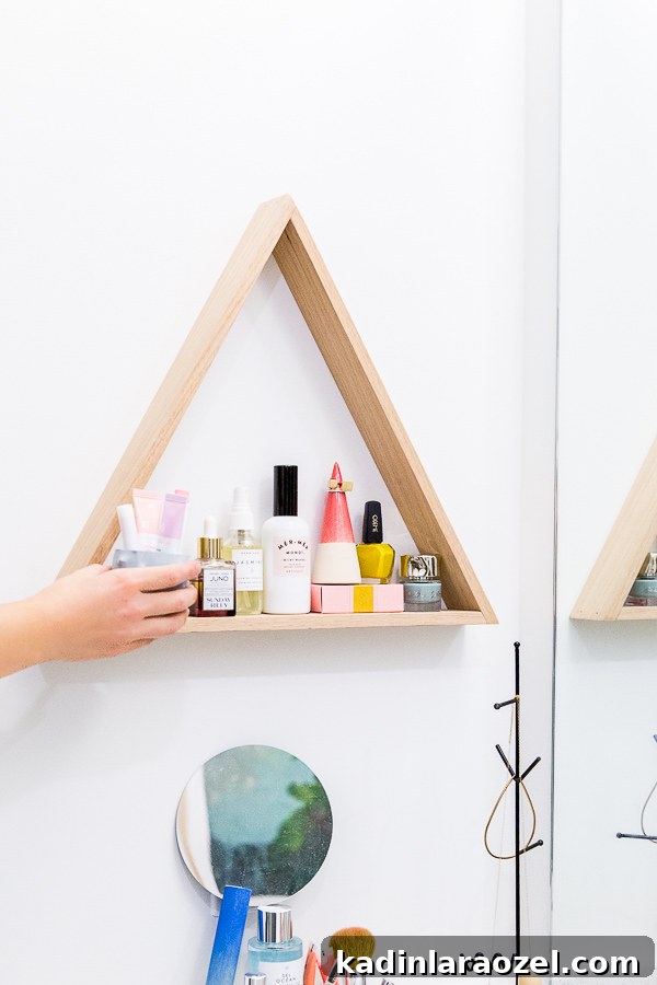 Before and After: My New Master Bathroom Remodel Reveal 11 Use a uniquely shaped shelf to store everyday items. Click through for the full reveal of this minimal modern bathroom makeover.
