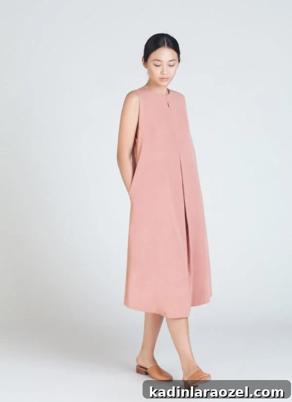 Spring Wardrobe: 9 Must-Have Dresses for the Season 9 A dusty pink dress from Kaarem.