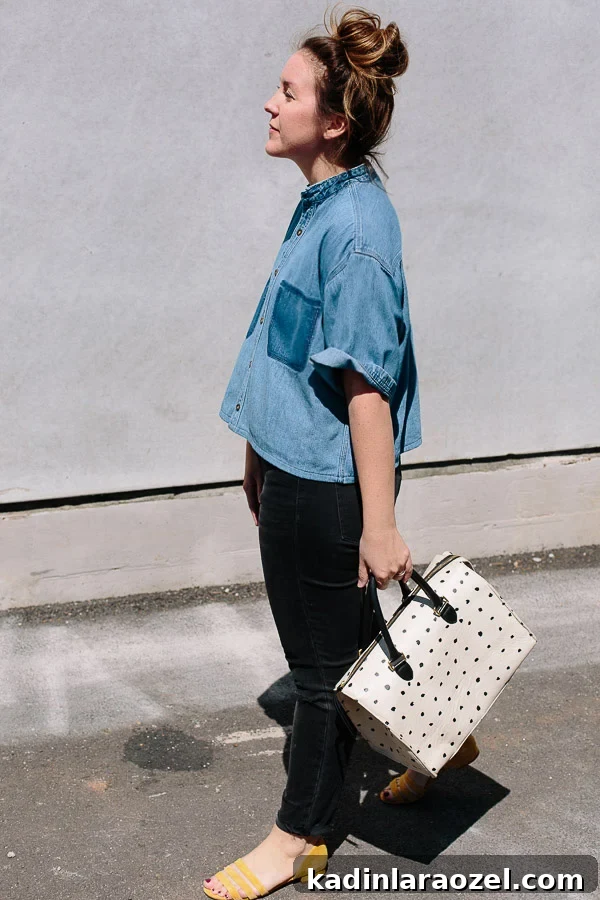 Turn Any Bag into a Custom Camera Bag: Step-by-Step Guide 5 Cropped jean shirt, black jeans, and a big bag.
