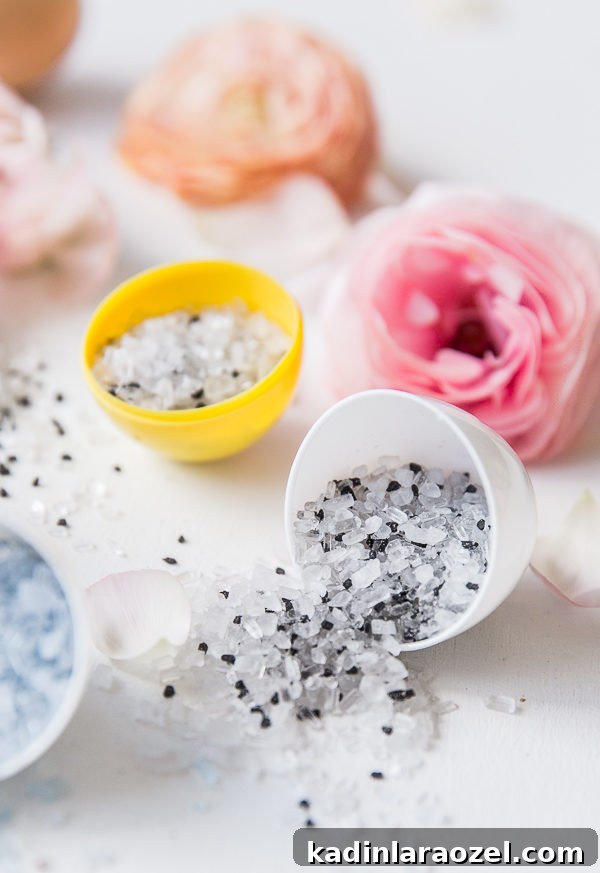 Make Your Own Easter Bath Bombs: Simple Step-by-Step Guide 4 Opened plastic Easter eggs in pastel colors, holding bath salts