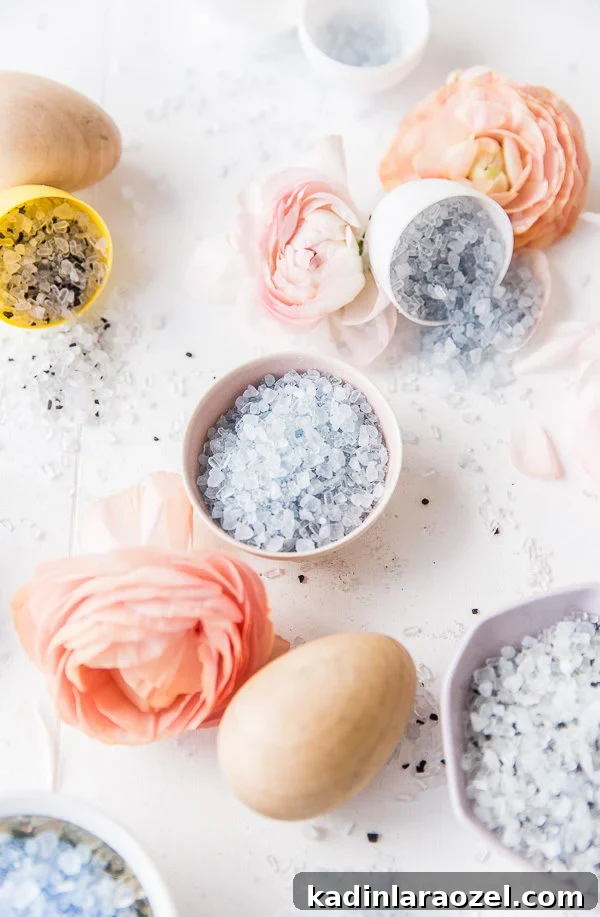 Make Your Own Easter Bath Bombs: Simple Step-by-Step Guide 5 Pastel blue bath salts inside Easter eggs and small bowls with flowers