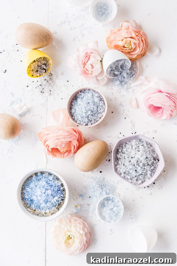 Make Your Own Easter Bath Bombs: Simple Step-by-Step Guide 7 Pastel bath salts inside Easter eggs with flowers on a white table