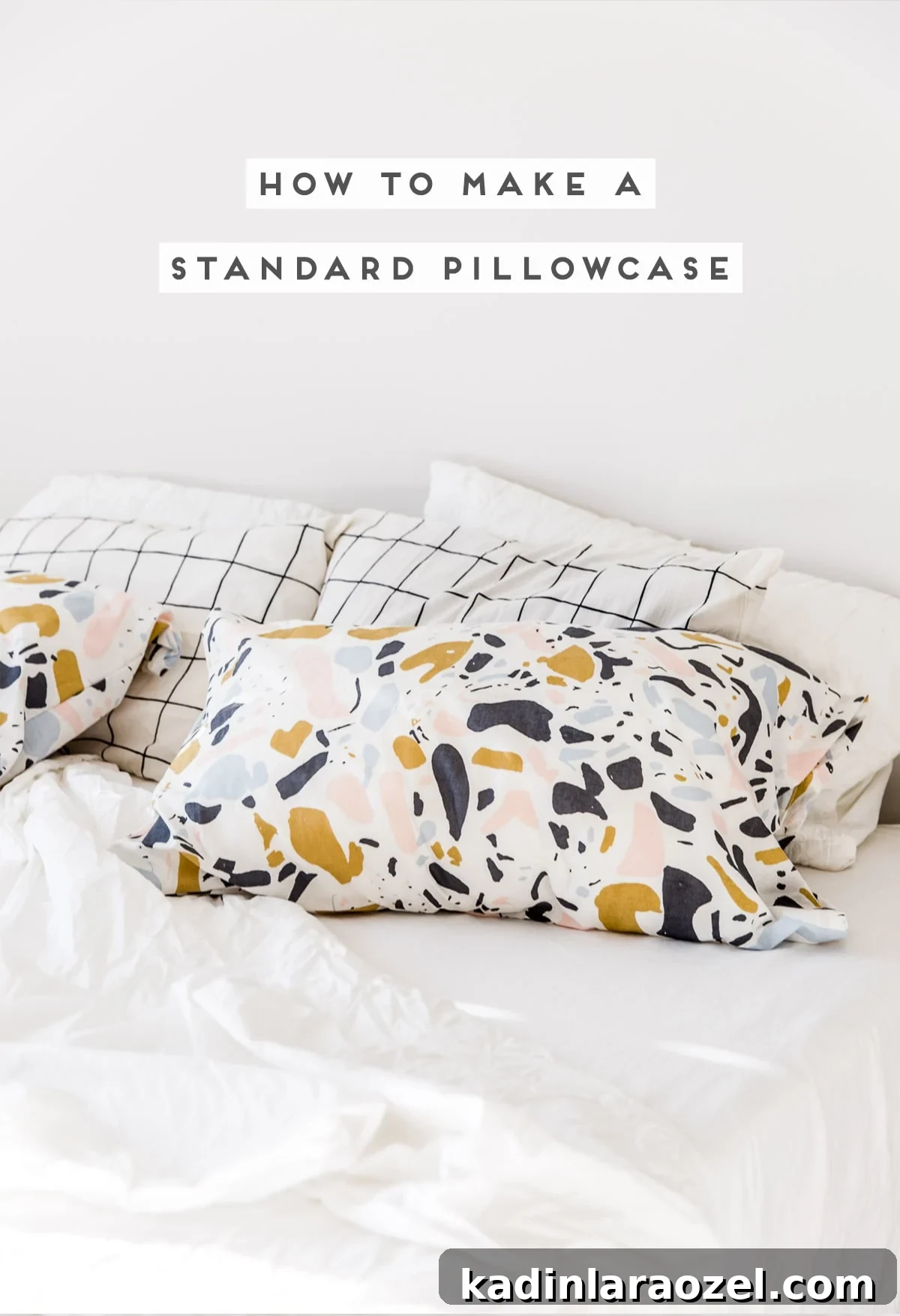 Pattern pillowcases that are handmade, on white bedding with sunlight streaming through
