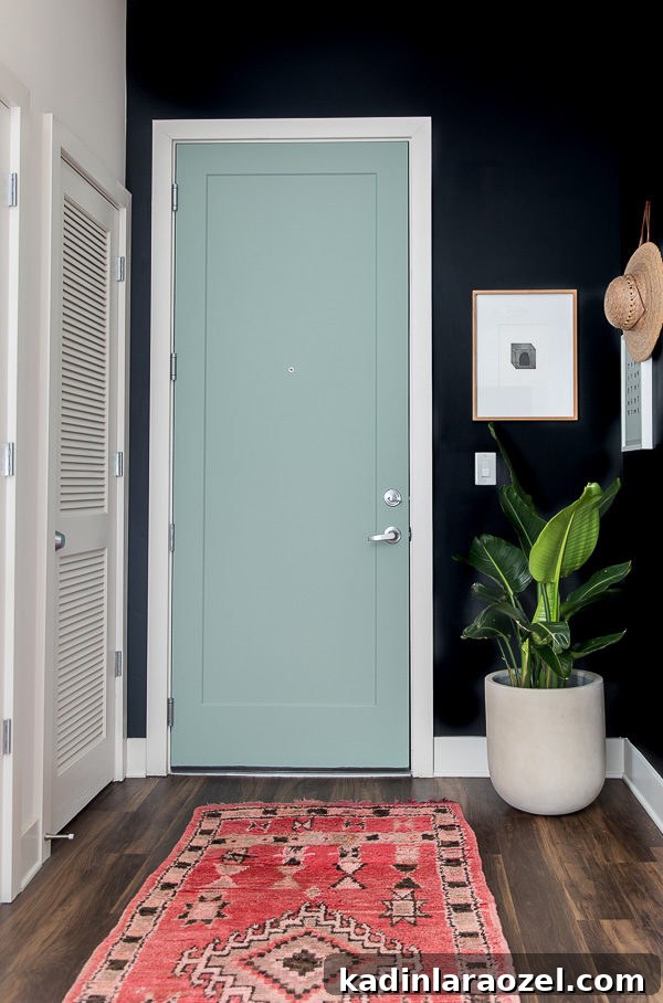 Minimal Modern Entryway Makeover: Stylish Small-Space Ideas 14 A minimal modern entryway makeover - bringing personality to a standard apartment with paint.