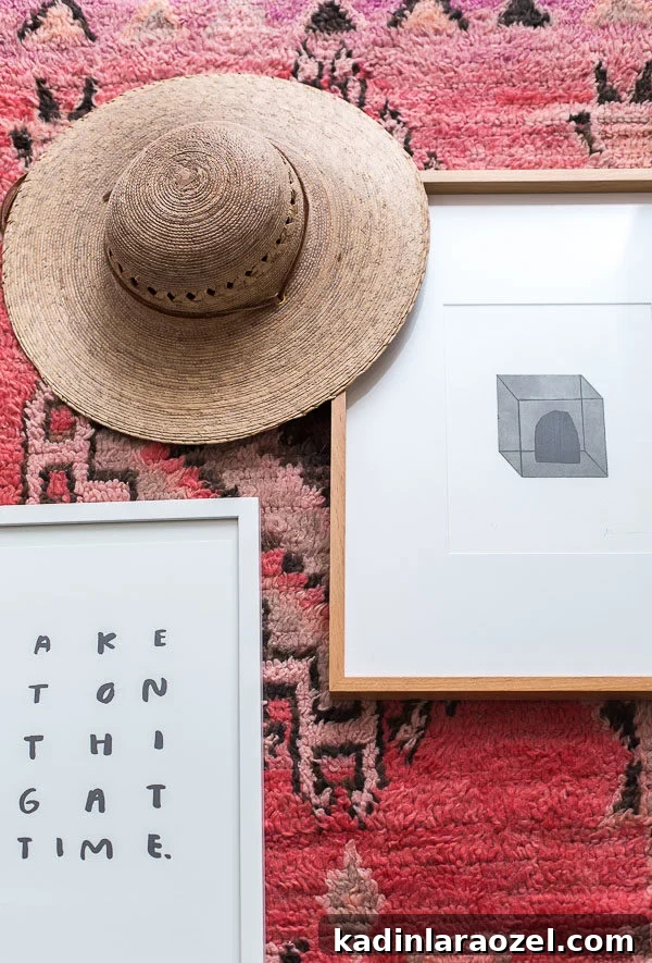 Minimal Modern Entryway Makeover: Stylish Small-Space Ideas 15 Minimal artwork and a colorful rug for an entryway