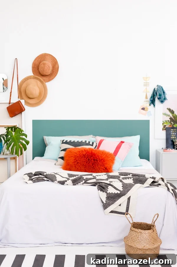 One-Hour DIY Headboard Project: Stylish Design You Can Build Now 2 Green painted headboard in white airy loft space.