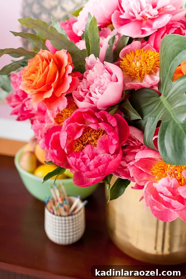 Styling a Mid-Century Sideboard: Tips for Timeless Decor 9 A tropical centerpiece