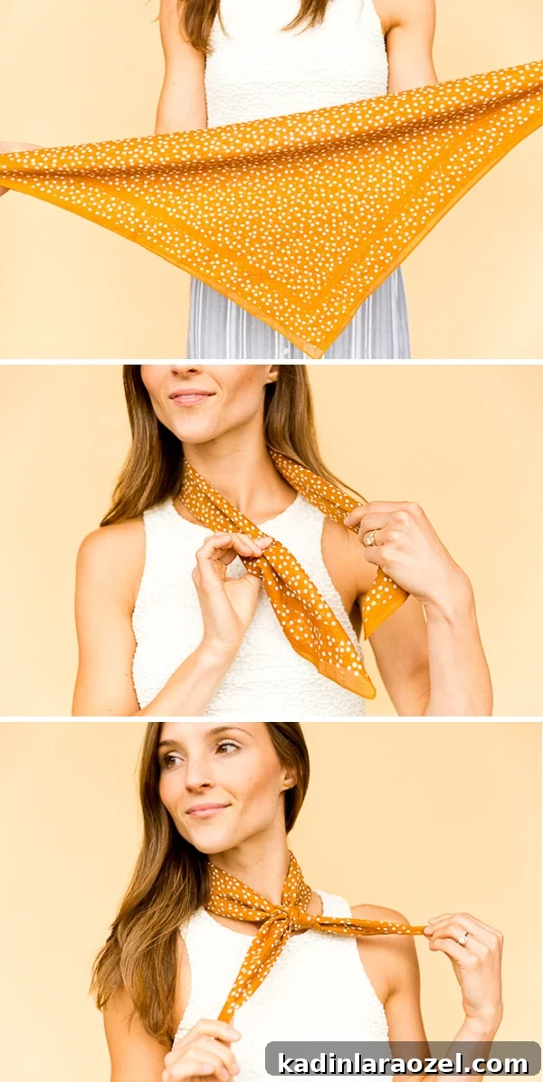 Woman showing how to style a bandana as a standard neckerchief.