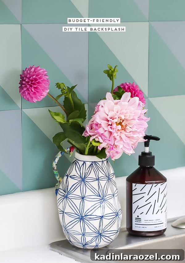 DIY budget backsplash for under $50! Click through for the step by step tutorial and before and after kitchen photos.