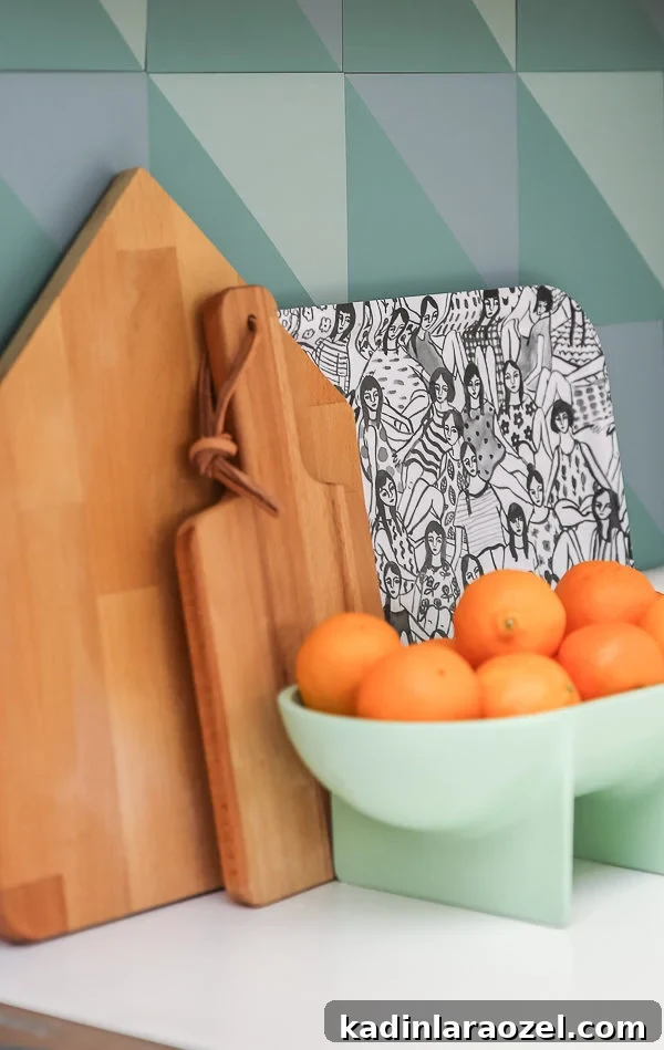 You'd never know this patterned tile was a DIY budget backsplash idea. Click through for the tutorial.