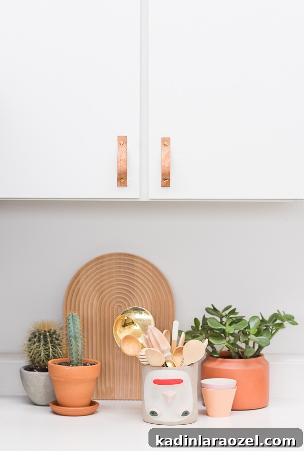 Make Leather Drawer Pulls: Step-by-Step Push-and-Pull Guide 3 Update your rental kitchen with these easy (and affordable) leather cabinet pulls. Click through to learn how to make leather cabinet pulls for your kitchen. #kitchen #diy #kitchendiy #leatherhandles #leatherdiy #cabinetpulls